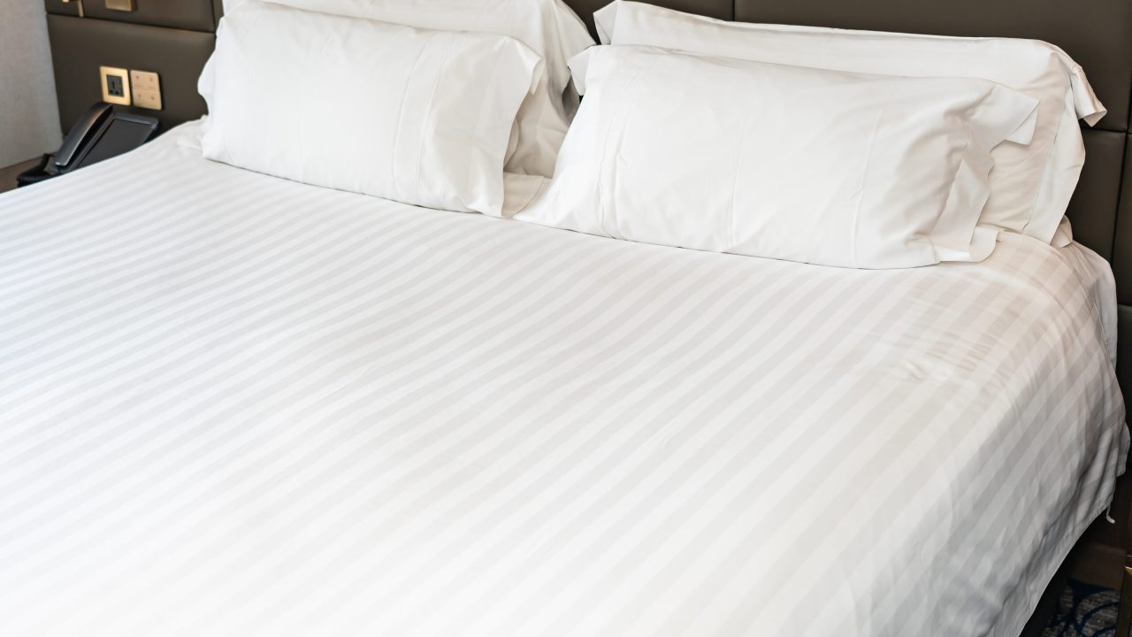 White pillow on bed decoration interior White pillow on bed decoration interior of bedroom